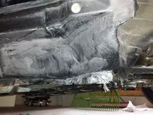 Giant hole... ugly but completely sealed behind layers of fiberglass. Now covered in paint and soaked in fluid film.
