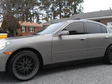 03 Sedan on 20x10.5 all around wrapped wit 245 30 20 tires!!