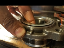 If I pulled that part at the bottom it comes out a little bit I don't know how much play would have when driving if someone has a Timken I like to know if it does the same thing