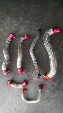 Wrapped my new silicone coolant hoses in braided sleeving and Earls clamps.