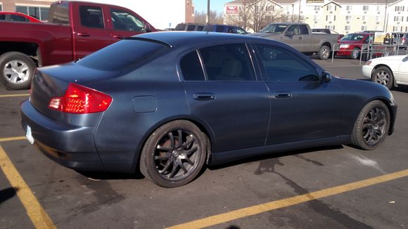 Custom color; matte black with 50/50 nebula blue and hyper black graphite in the top coat gloss. Painter has streaking issues though.