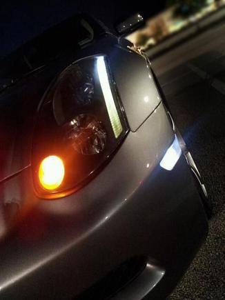 Painted headlights (black), LED in clearance strip, LED in clear corners.