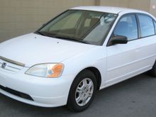 '02 Honda Civic LX 1.7 with 185,000 miles!  :-) 