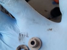 These bushings hold the relief spring. One failed entirely, the other is cracked