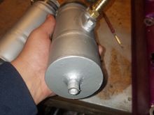 These are 3 piece/chamber tanks. The middle has the main baffle material (stainless brillo), the top has an air filter material (charcoal filter), and the bottom is just a drainage tank (with a 5/16 nut welded on and plugged w/bolt and rubber washer, for emptying it)