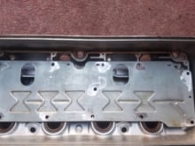 Reference pic to show holes for fittings vs holes in baffle plate
VERY IMPORTANT: you can not put the fittings in the same chambers that the holes in the baffle plate feed into... otherwise you'll just be blowing oil out of your VC