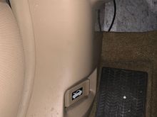 Water on drivers side where the gas cap release lever is located
