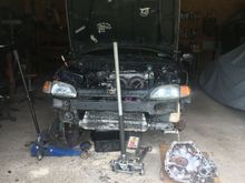 Car sitting with the old transmission out and the new one ready. Just waiting on a clutch and fly wheel. Car also getting new front end parts like my hatch lots to do!