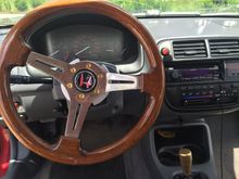 Bored at work today. I want to restore my steering wheel, it's a bit faded with some scuffs and a few small pits. I used Flitz on it and that seemed to help a bit but I'm still not satisfied with it.