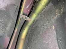 This area was pretty easy to get to. I just used a plastic removal tool and popped off the old plastic mounting screws. I believe there were 2 in the wheel well and 2 at the bottom.