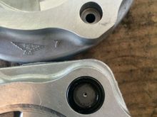On the top is the piston housing and the where the fluid would normally exit. On the bottom is the "middle" plate with the regulating orifice. That will have to be blocked as well.