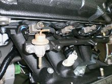 stock fuel rail powder coated along with alt bracket, engine mount brackets, coolant cross over tube and T stat.