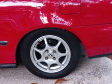 Painted inner wheel wells and drums with hi temp black.