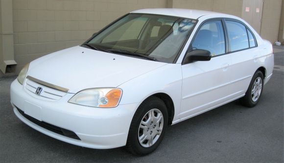 '02 Honda Civic LX 1.7 with 185,000 miles!  :-) 