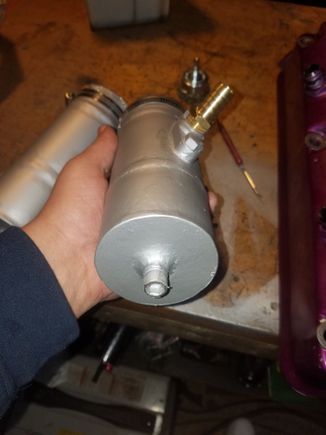 These are 3 piece/chamber tanks. The middle has the main baffle material (stainless brillo), the top has an air filter material (charcoal filter), and the bottom is just a drainage tank (with a 5/16 nut welded on and plugged w/bolt and rubber washer, for emptying it)