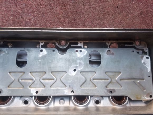 Reference pic to show holes for fittings vs holes in baffle plate
VERY IMPORTANT: you can not put the fittings in the same chambers that the holes in the baffle plate feed into... otherwise you'll just be blowing oil out of your VC