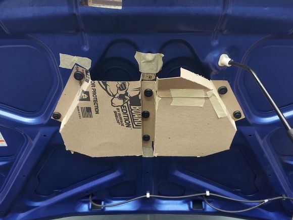 Templates made from cardboard.  These are the rain trays that will go under the openings that will get cut.  They allow the water that will get in to drain in a safe area.