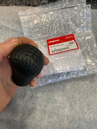 I bought a new ITR shift knob just before they were discontinued, I had the red stiching removed and had it redone with black- so as to match the original EM1 shift knob (that has been long discontinued). I also bought the matching shift boot which lets the knob click in. 