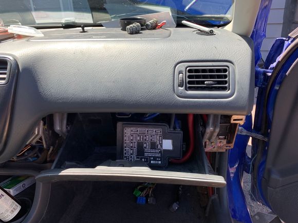 Well.. it’s relocated. But I am very not happy with it. I need it to be mounted. I also like the function of my glove box, the fuse box hits the dash bar when you try to close the glove box.. I am thinking of ditching my airbag and mounting under the cover. I hacked my glove box and will replace lol. Or reinvent my idea (better more thought out cuts) with a new fuse box even if I do keep it here. I am down sizing my power wire. It’s 1AWG now, but I’m going to set it up with 4AWG. 