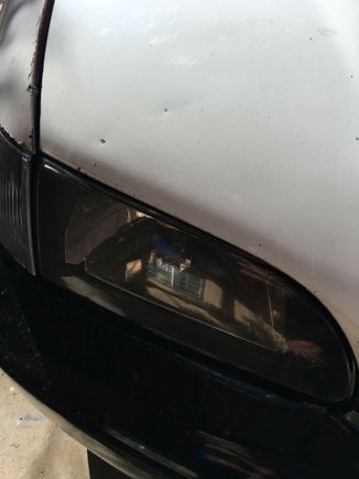 Hood is putting pressure on passenger side headlight