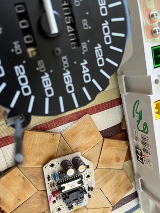 Brown marks on top of the old capacitors, but the tops are not split open