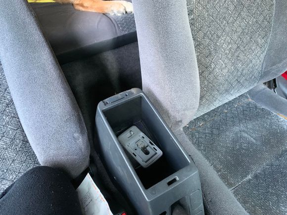The armrest was two screws to pull off. I believe it's 6 screws to separate the two top pieces. This was the easiest part of the job in all aspects.