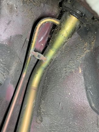 This area was pretty easy to get to. I just used a plastic removal tool and popped off the old plastic mounting screws. I believe there were 2 in the wheel well and 2 at the bottom.