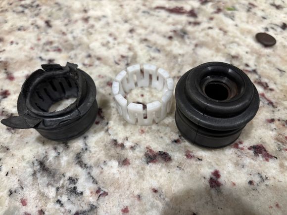 Old bushing on the left allowed the shifter to move up and down about a half inch