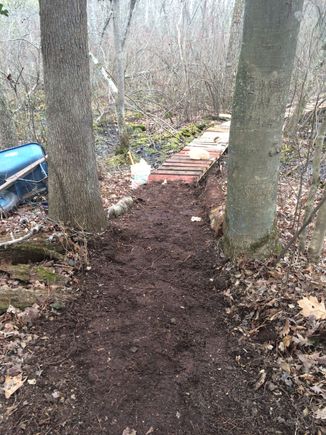 Hillside approach to bridge landing