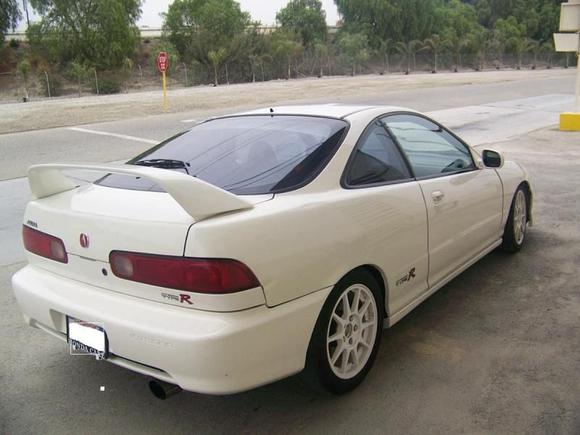 Tint just removed, by a shop, not a razor blade. Don't mind the ding, car will be painted in the near future to a bright Orange........ YEAH RIGHT!