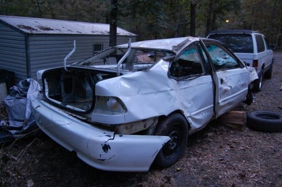 Wrecked 98 Coupe, A week and half later almost completely rebuilt.