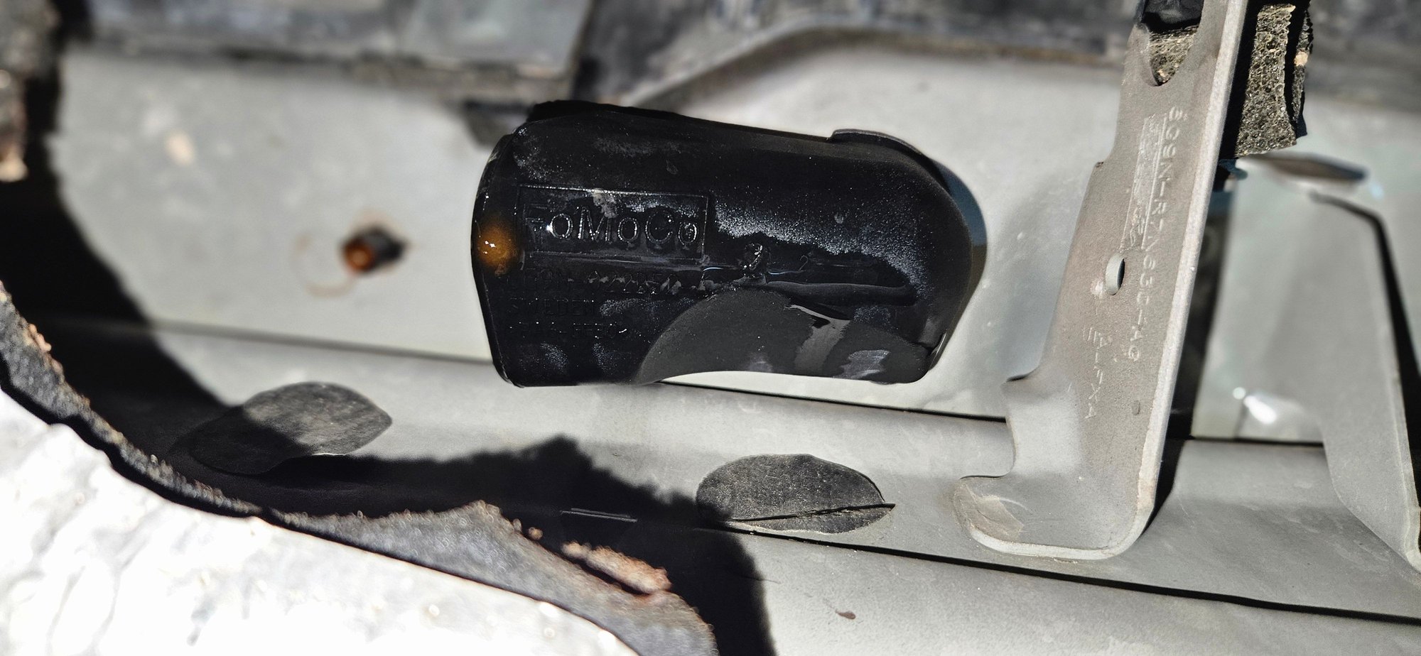 This is up against the wall between driver and engine.