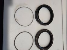 LR OE seal on top, Corteco seal on bottom. Obviously a noticable difference in spring diameters...