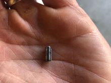 Another view. Looks like its a pin of some sort. 
