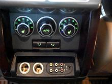 Back of center console showing 4-Zone A/C of Autobiography edition.