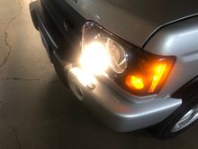 When I turn on the low beams.