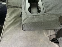 Rear center armrest folded down - the armrest is covered as is the cup holder insert pictured