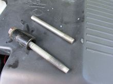 Guide stud and 'snugging' bolt.  