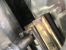 Two bolts hold it in place, 8mm