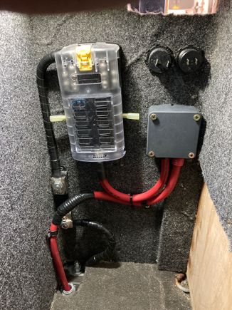 Interior sub panel for 2x 12v, 1x 30A Anderson socket, 1x refrigerator, 3x USB charging ports, and room to spare. 4ga marine wire run along frame in conduit.