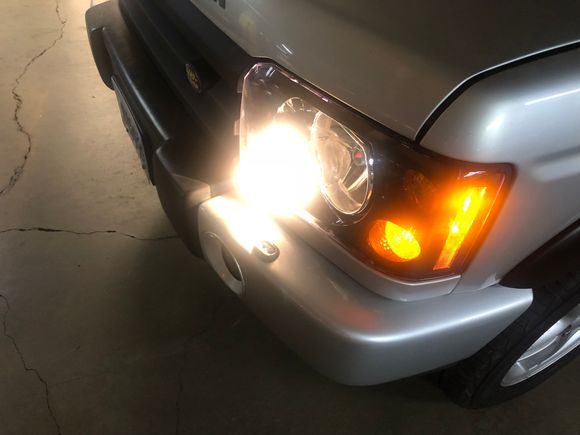 When I turn on the low beams.