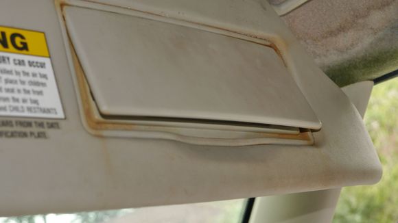 passenger side visor damage from water leak