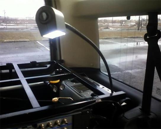 Mounterd on the rear left passenger side with seat folded. Behind, you can see an Apple Mac G4 dual 1.42 ghz for my Entertainment System. Also, I custom fabricated a cargo cage instead of installing a roof rack which hold enough equipment and storage.