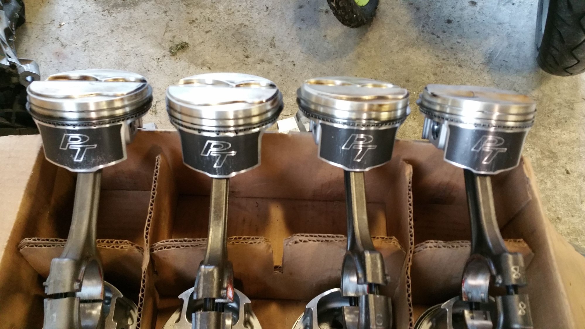 Wiseco pistons on stock floating rods, resized with ARP bolts