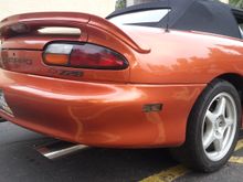 (now) 4/16 1998 Z28 SOMkinda Orange, 5.3L swapped at 139,000, A4, convertible, Halo Projector beams, Blacked out billet grille tinted rear side markers SLP lid, Flowmaster,  O.E.17x9.5 SS rims w/Nitto drag radials, Drilled/Slotted rotors front and rear with ceramic pads, carbon print emblems and badging. 146,000 miles. Daily driver.