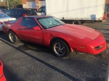 Red 1987 Pontiac Firebird Formula 350 - Car was hit on passenger side while parked.