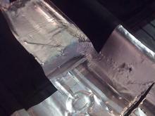 Floor coated in sound deadening material