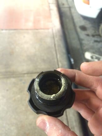 fresh reman motor from jasper, 5.3. Just noticed this under the oil cap. I haven't driven it maybe 70 miles since I've swapped motors and I'm wondering if maybe it's just condensation build up from it sitting a few months after the swap combined with the cold weather we've been having. Any thoughts?