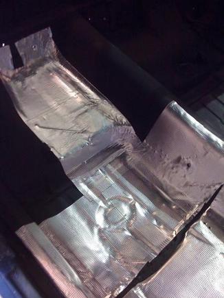 Floor coated in sound deadening material