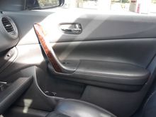 Picture showing passenger side and opened glove compartment.